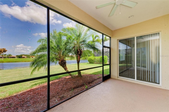 8772 Stone Harbour Loop, Bradenton, FL 34212 - unfurnished sunroom with a water view and a ceiling fan
