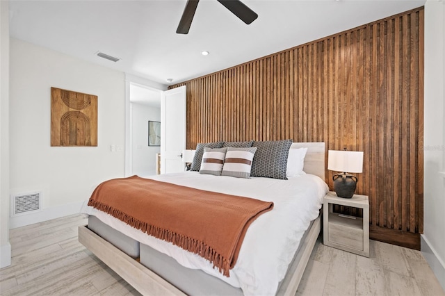 109 Palmetto Ave, Anna Maria, FL 34216 - bedroom with wood finished floors, ceiling fan, baseboards, and recessed lighting