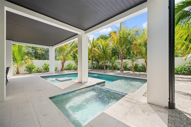 109 Palmetto Ave, Anna Maria, FL 34216 - view of swimming pool featuring a fenced backyard, a patio, and a pool with connected hot tub