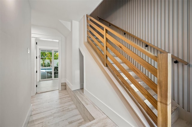 109 Palmetto Ave, Anna Maria, FL 34216 - staircase with baseboards and wood finished floors