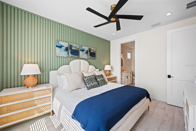 109 Palmetto Ave, Anna Maria, FL 34216 - bedroom featuring wood finished floors, baseboards, recessed lighting, connected bathroom, and a ceiling fan