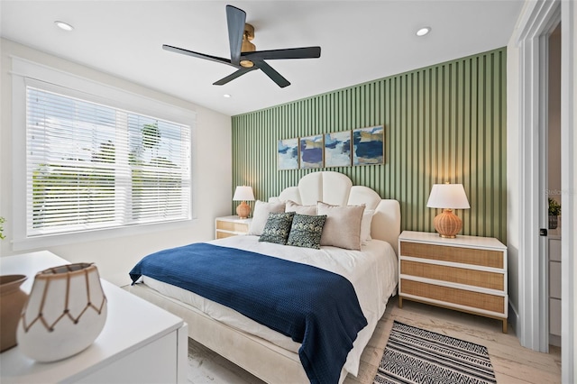109 Palmetto Ave, Anna Maria, FL 34216 - bedroom with an accent wall, recessed lighting, ceiling fan, and wood finished floors