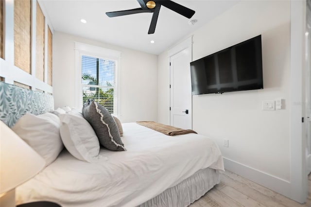 109 Palmetto Ave, Anna Maria, FL 34216 - bedroom featuring light wood-style flooring, baseboards, recessed lighting, and a ceiling fan