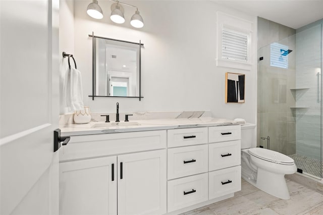109 Palmetto Ave, Anna Maria, FL 34216 - bathroom with vanity, a shower stall, toilet, and marble finish floors
