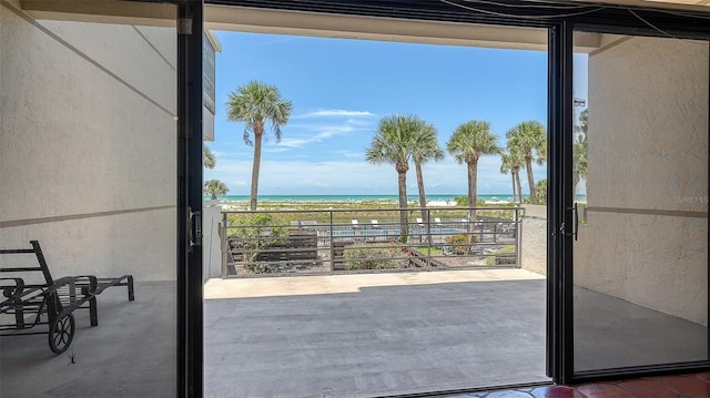 222 Beach Rd Unit 7, Sarasota, FL 34242 - entryway featuring view of water and beach