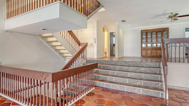 222 Beach Rd Unit 7, Sarasota, FL 34242 - staircase with ceiling fan, recessed lighting, and tile patterned floors