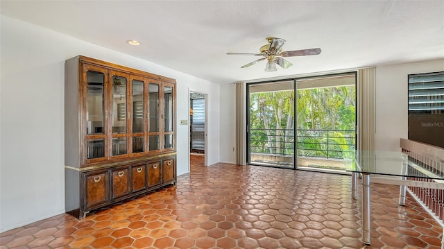 222 Beach Rd Unit 7, Sarasota, FL 34242 - spare room with ceiling fan, recessed lighting, and expansive windows