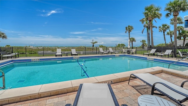 222 Beach Rd Unit 7, Sarasota, FL 34242 - community pool featuring a patio area