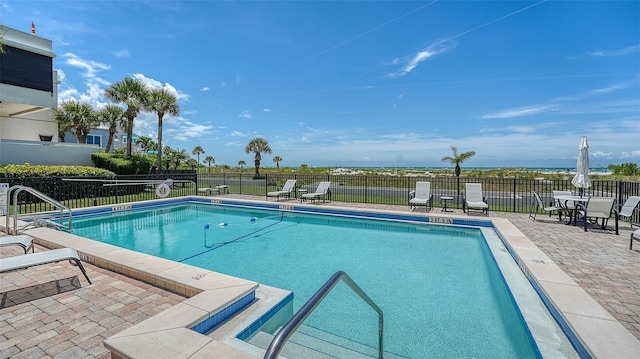 222 Beach Rd Unit 7, Sarasota, FL 34242 - community pool featuring a patio