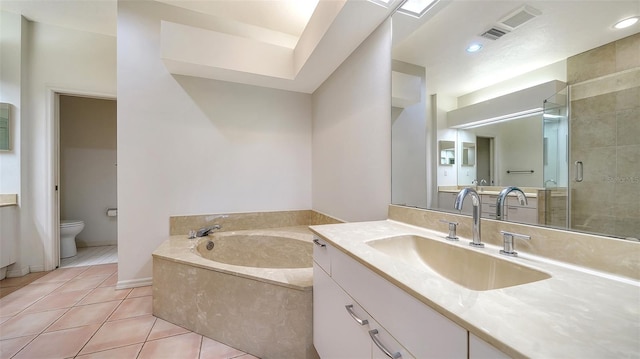 3317 Highlands Bridge Rd Unit 61, Sarasota, FL 34235 - bathroom with a garden tub, tile patterned flooring, vanity, a stall shower, and recessed lighting
