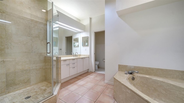 3317 Highlands Bridge Rd Unit 61, Sarasota, FL 34235 - full bathroom with a garden tub, vanity, a shower stall, and tile patterned flooring