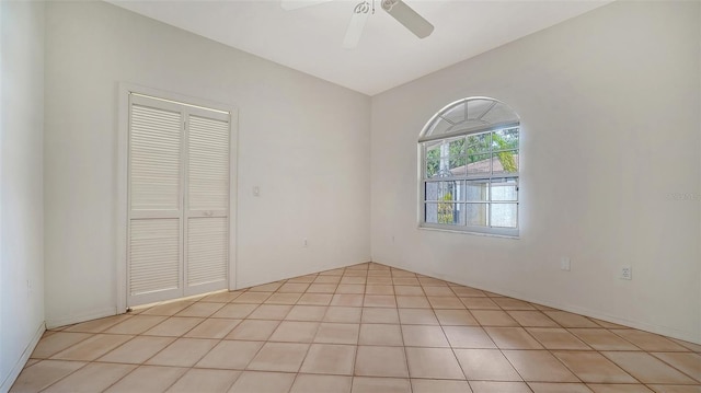 3317 Highlands Bridge Rd Unit 61, Sarasota, FL 34235 - unfurnished room with a ceiling fan and light tile patterned floors