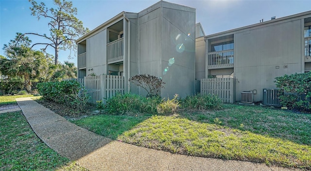 137 Woodland Pl, Osprey, FL 34229 - view of home's exterior featuring a central AC unit