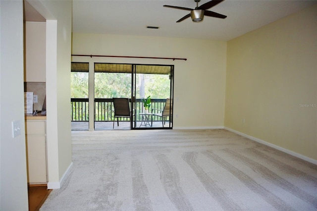 137 Woodland Pl, Osprey, FL 34229 - carpeted spare room featuring a ceiling fan and baseboards