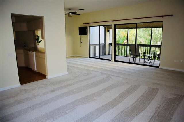 137 Woodland Pl, Osprey, FL 34229 - empty room featuring carpet and a ceiling fan