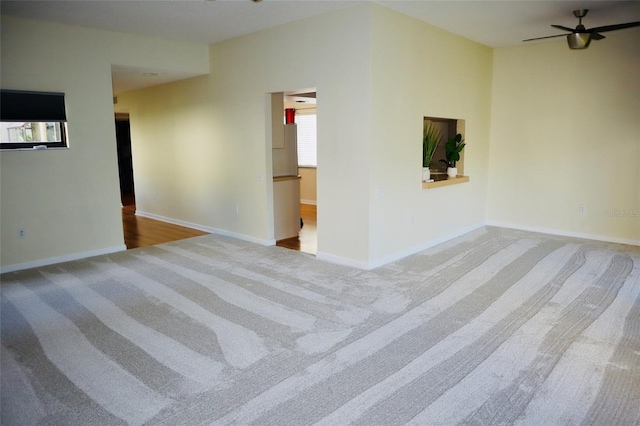 137 Woodland Pl, Osprey, FL 34229 - carpeted spare room featuring ceiling fan and baseboards