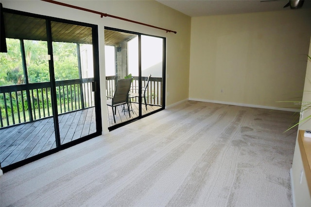 137 Woodland Pl, Osprey, FL 34229 - unfurnished room featuring carpet flooring and baseboards