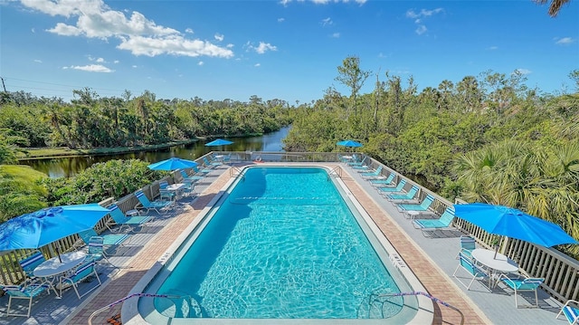 137 Woodland Pl, Osprey, FL 34229 - community pool featuring view of wooded area and a water view