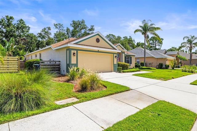 743 Stonecrest Dr, Sarasota, FL 34232 - ranch-style house featuring stucco siding, an attached garage, and driveway