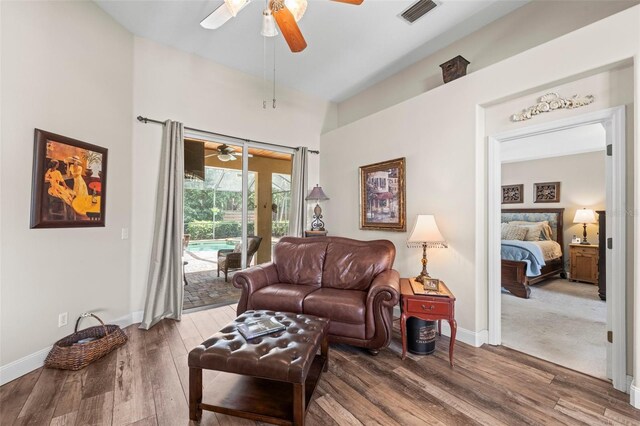 743 Stonecrest Dr, Sarasota, FL 34232 - living room featuring ceiling fan, wood finished floors, and baseboards