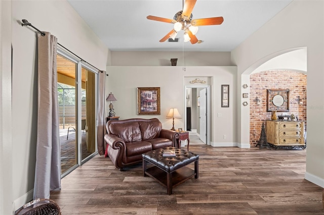 743 Stonecrest Dr, Sarasota, FL 34232 - living area featuring dark wood-type flooring, a ceiling fan, and baseboards
