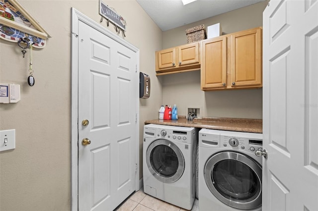743 Stonecrest Dr, Sarasota, FL 34232 - washroom with separate washer and dryer, cabinet space, and light tile patterned floors