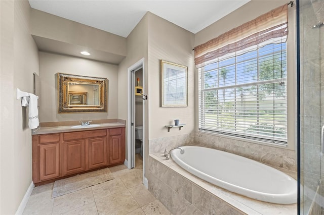 743 Stonecrest Dr, Sarasota, FL 34232 - bathroom featuring a bath, vanity, toilet, and tile patterned floors