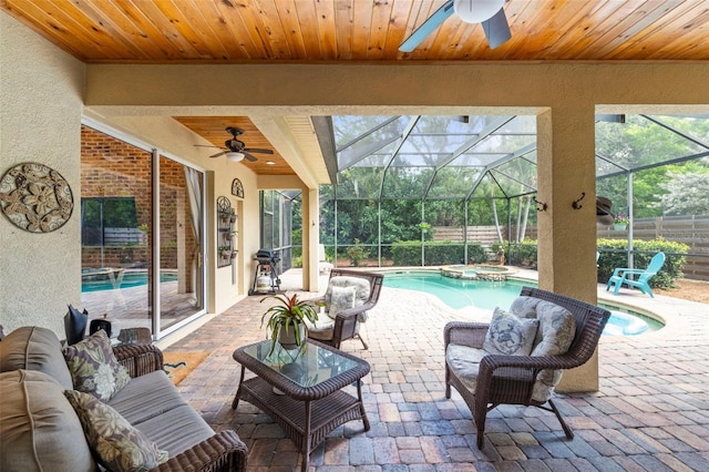 743 Stonecrest Dr, Sarasota, FL 34232 - view of patio featuring ceiling fan, area for grilling, outdoor lounge area, and a pool with connected hot tub