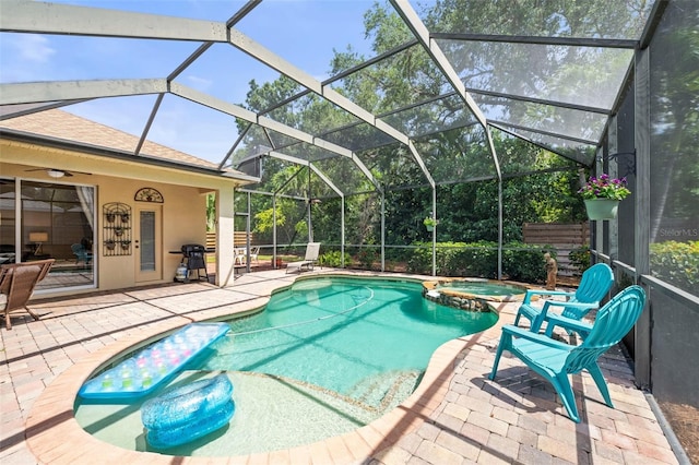 743 Stonecrest Dr, Sarasota, FL 34232 - view of pool with a patio area, a pool with connected hot tub, a grill, ceiling fan, and glass enclosure