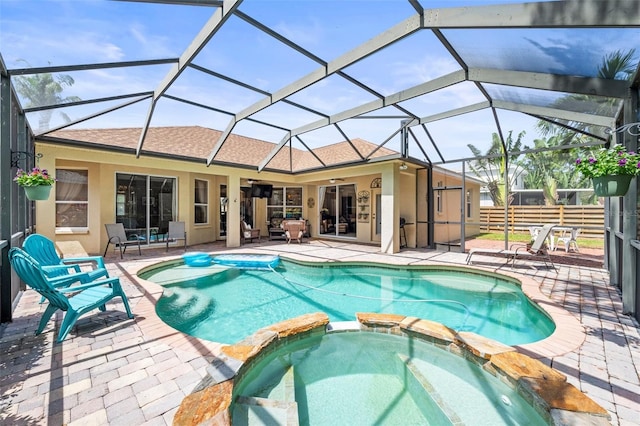 743 Stonecrest Dr, Sarasota, FL 34232 - view of swimming pool with a pool with connected hot tub, a patio, ceiling fan, and a lanai