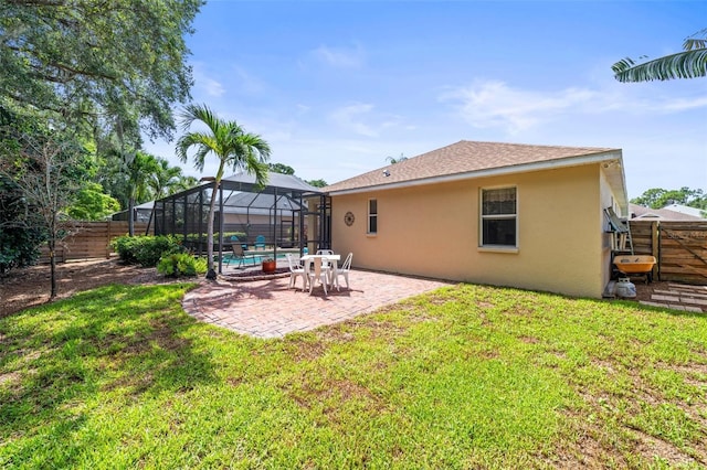743 Stonecrest Dr, Sarasota, FL 34232 - rear view of property with stucco siding, a patio, and a lanai
