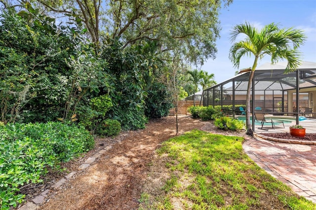 743 Stonecrest Dr, Sarasota, FL 34232 - view of yard with an outdoor pool and a lanai
