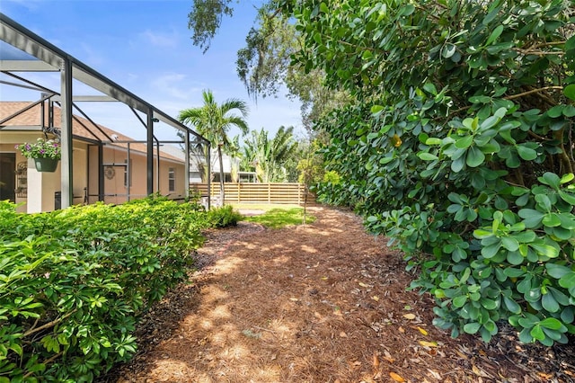 743 Stonecrest Dr, Sarasota, FL 34232 - view of yard featuring glass enclosure