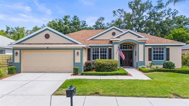 743 Stonecrest Dr, Sarasota, FL 34232 - ranch-style home featuring stucco siding, a front yard, a garage, and concrete driveway