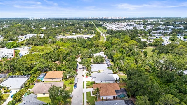 743 Stonecrest Dr, Sarasota, FL 34232 - aerial perspective of suburban area with a tree filled landscape