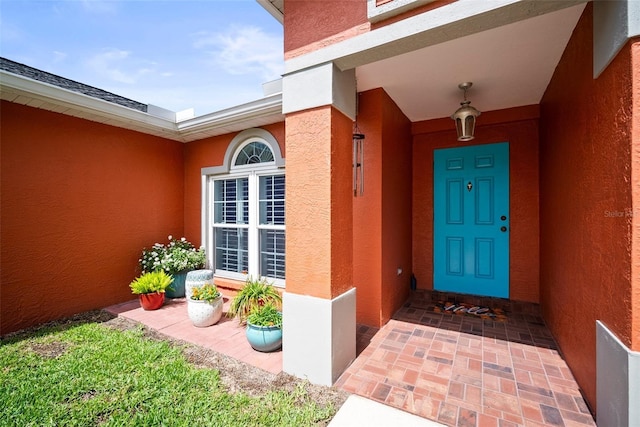 4194 Banbury Cir, Parrish, FL 34219 - doorway to property featuring stucco siding