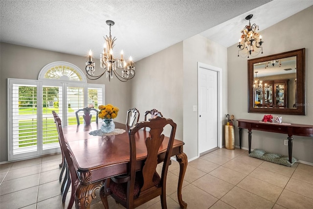 4194 Banbury Cir, Parrish, FL 34219 - dining area featuring a chandelier, plenty of natural light, light tile patterned floors, a textured ceiling, and baseboards