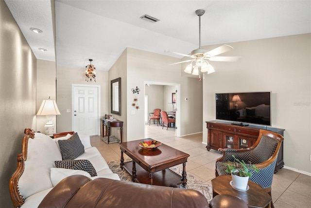 4194 Banbury Cir, Parrish, FL 34219 - living room featuring light tile patterned floors, ceiling fan, and baseboards