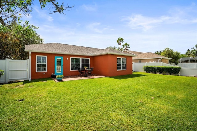 4194 Banbury Cir, Parrish, FL 34219 - back of house featuring stucco siding, a patio, and a shingled roof
