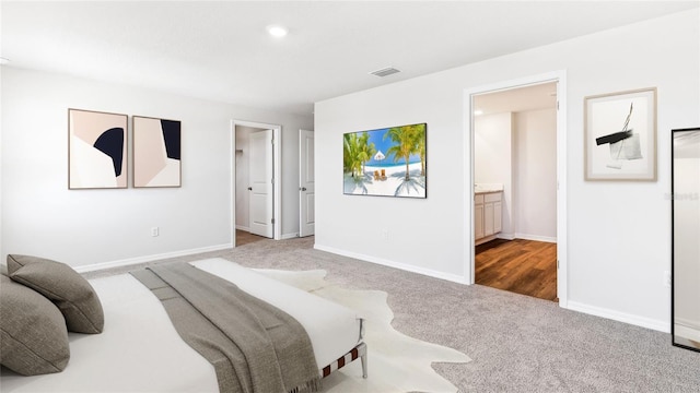 12064 Lansing Gln, Parrish, FL 34219 - bedroom with carpet flooring, baseboards, recessed lighting, and ensuite bathroom