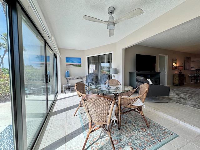 3500 El Conquistador Pkwy Unit 347, Bradenton, FL 34210 - dining area with a textured ceiling and ceiling fan