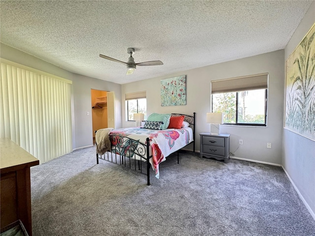 3500 El Conquistador Pkwy Unit 347, Bradenton, FL 34210 - carpeted bedroom with a ceiling fan, a walk in closet, and a closet