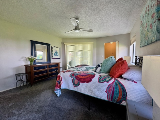 3500 El Conquistador Pkwy Unit 347, Bradenton, FL 34210 - bedroom featuring multiple windows, carpet floors, a ceiling fan, and a textured ceiling