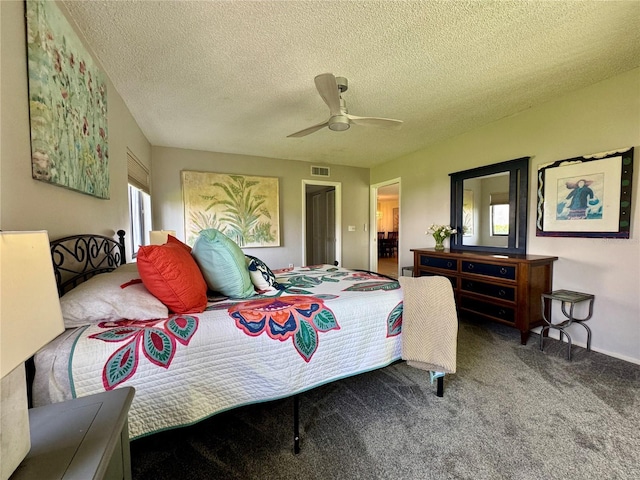 3500 El Conquistador Pkwy Unit 347, Bradenton, FL 34210 - carpeted bedroom with a textured ceiling and a ceiling fan