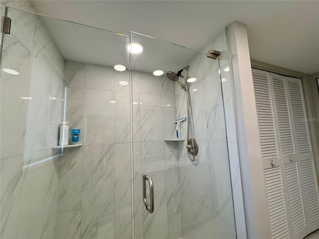 3500 El Conquistador Pkwy Unit 347, Bradenton, FL 34210 - bathroom with a closet and a marble finish shower