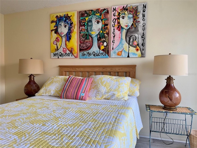 3500 El Conquistador Pkwy Unit 347, Bradenton, FL 34210 - bedroom featuring wood finished floors and baseboards