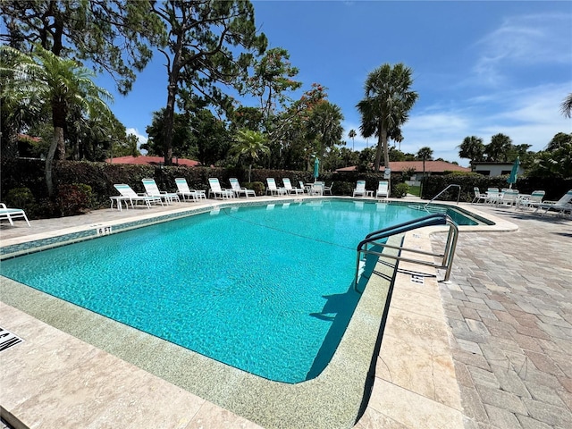 3500 El Conquistador Pkwy Unit 347, Bradenton, FL 34210 - community pool featuring a patio