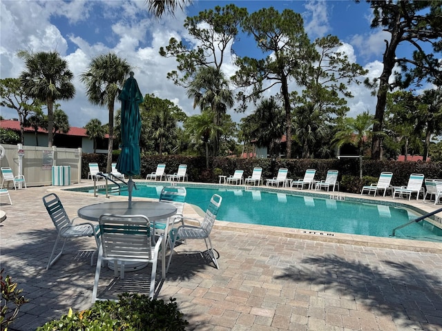 3500 El Conquistador Pkwy Unit 347, Bradenton, FL 34210 - community pool featuring a patio area