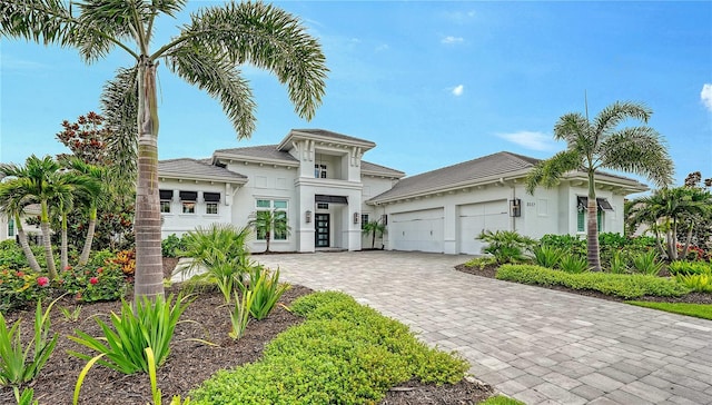 8537 Pavia Way, Bradenton, FL 34202 - view of front of property featuring an attached garage, stucco siding, and decorative driveway