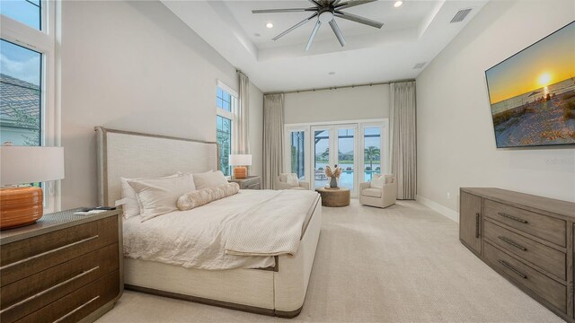 8537 Pavia Way, Bradenton, FL 34202 - bedroom with access to exterior, a raised ceiling, light carpet, recessed lighting, and a ceiling fan